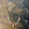 Collana con frangia di pesciolini smaltati